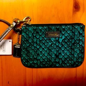 Beautiful emerald green snakeskin pattern COACH wristlet purse